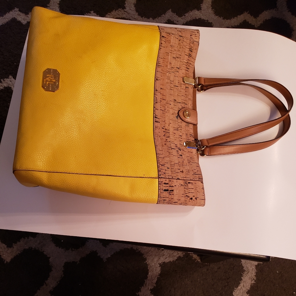 Ralph Lauren female yellow handbag in good condition.